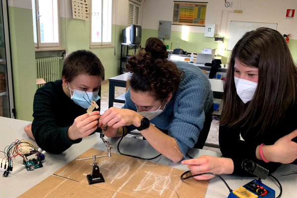 Students in the HoPE program in the first stages of constructing their eyeglasses with built-in proximity sensors for the vision-impaired