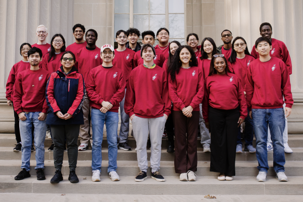 Some of the students who attended the recent FLI Week of Celebration events gathered for a group photo in their red FLI sweatshirts, designed to build greater awareness of first-generation and/or low-income identities. 