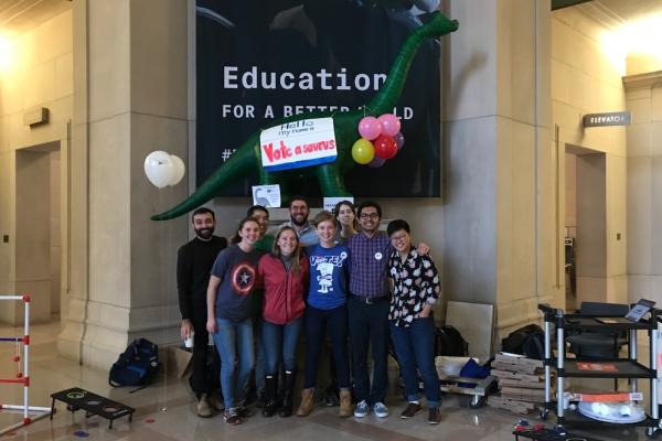 Members of MITvote with the Vote-a-saurus mascot