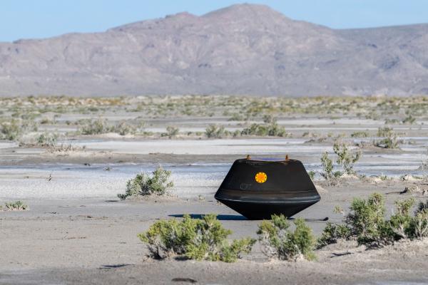 The sample return capsule from NASA’s OSIRIS-REx mission, shown blackened from its reentry through Earth’s atmosphere, parachuted safely down to the Utah desert on Sunday, Sept. 24, 2023. The capsule contains about 250 grams of regolith, or soil, from the near-Earth asteroid Bennu, which the mission’s spacecraft collected in October 2020. The sample’s primitive contents could give clues to the first materials that shaped the early solar system.